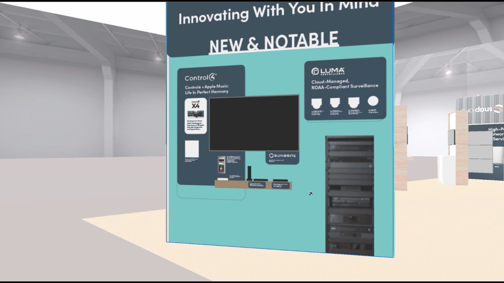 Frame from the 3D booth walkthrough video: the "New and Notable" wall in the 3D model