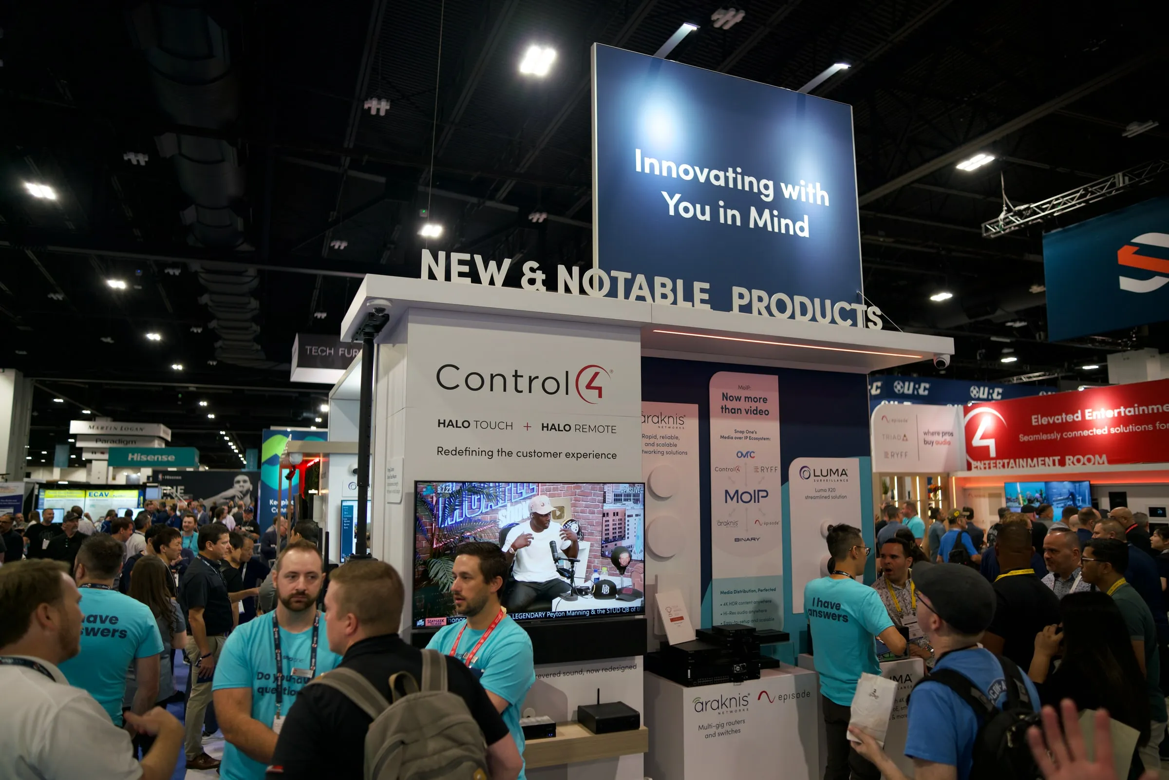 Crowded "New and Notable Products" section of the booth