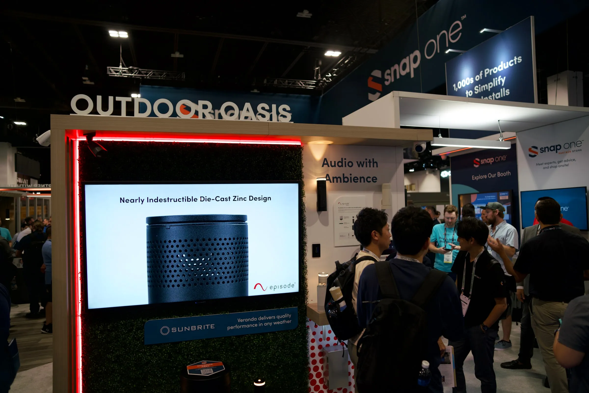 "Outdoor Oasis" area with a lit screen and outdoor speakers