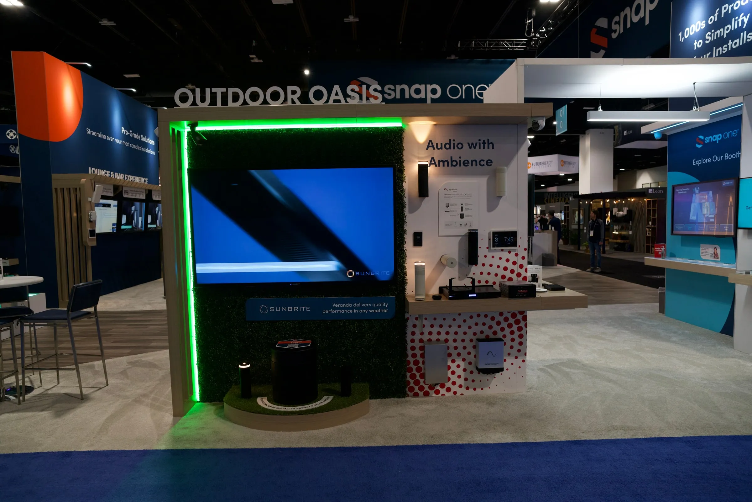Outdoor Oasis area with a green-lit screen frame