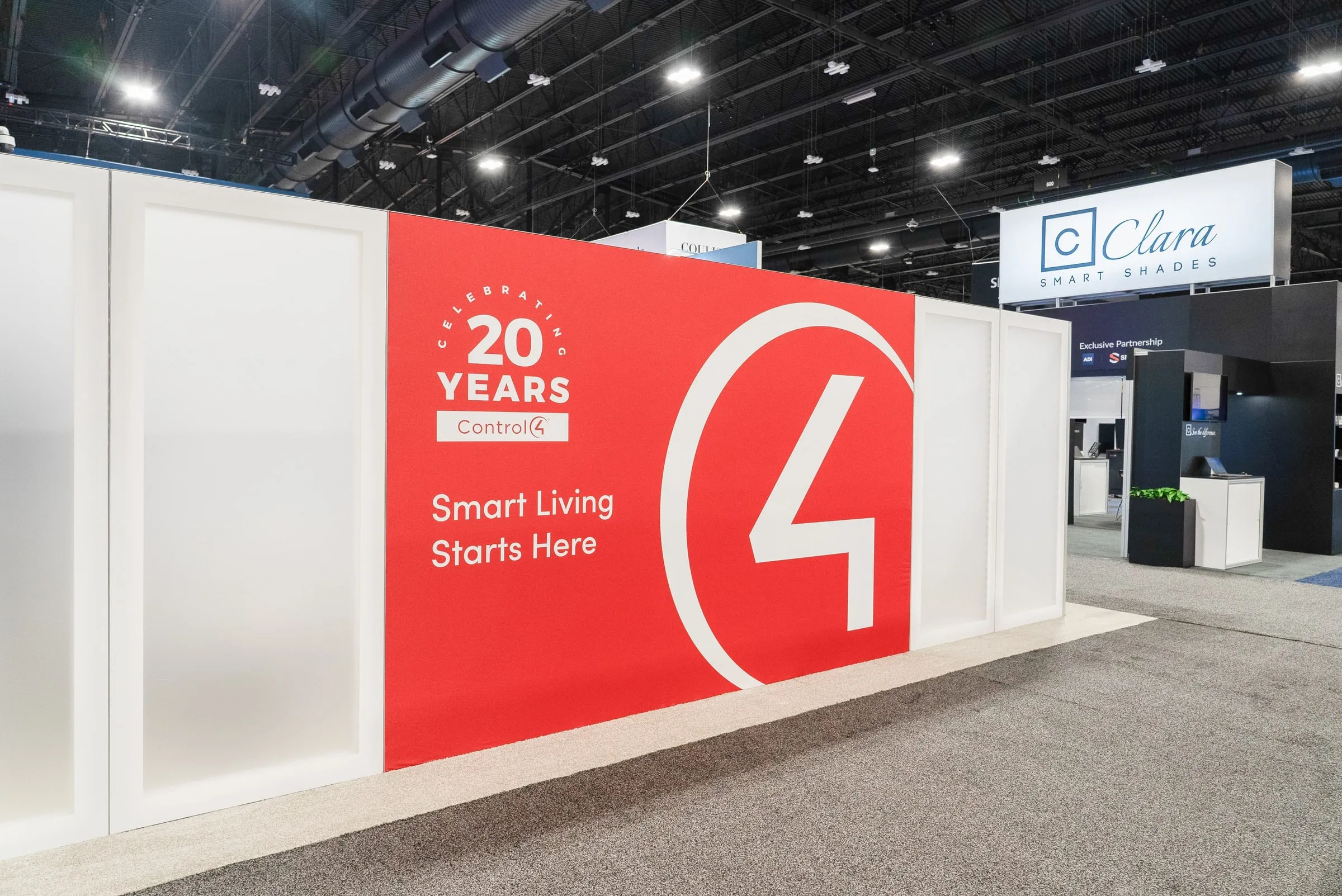 Red Control4 "20 Years, Smart Living Starts Here" wall
