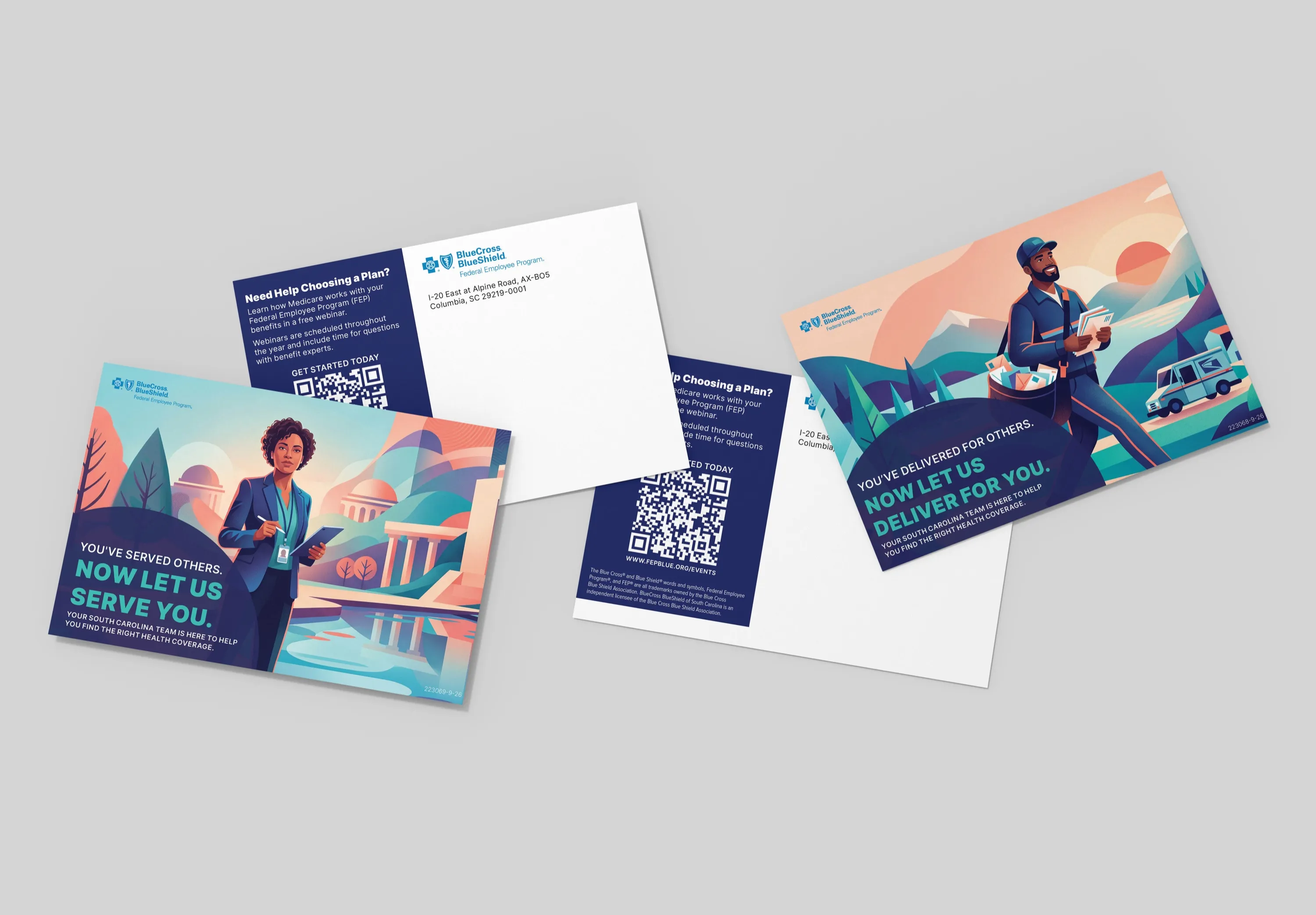 The two postcards scattered at an angle, fronts and backs, on a light gray surface