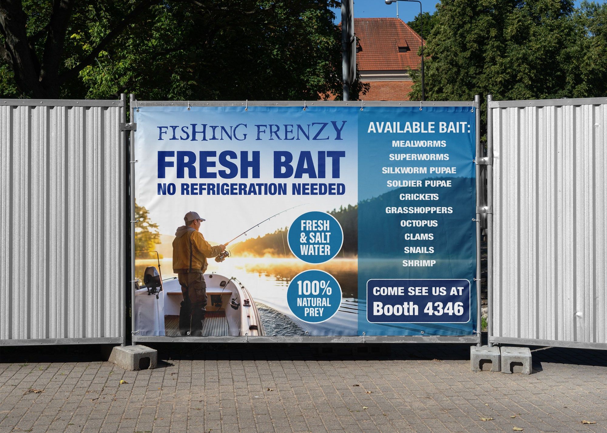 Fishing Frenzy fresh bait banner on a fence at an outdoor event