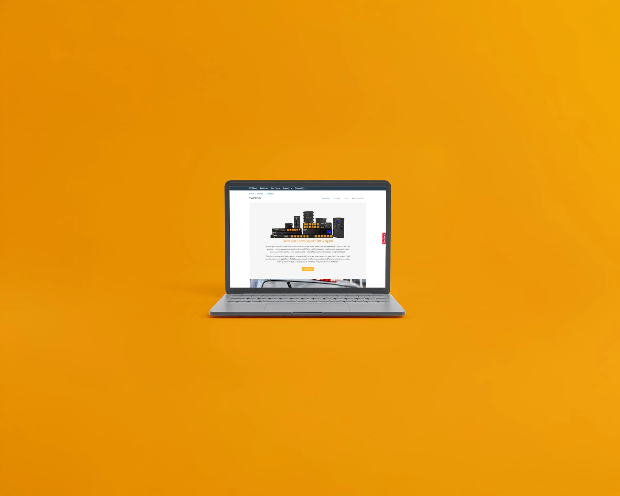 WattBox brand page on a laptop, wide view on orange